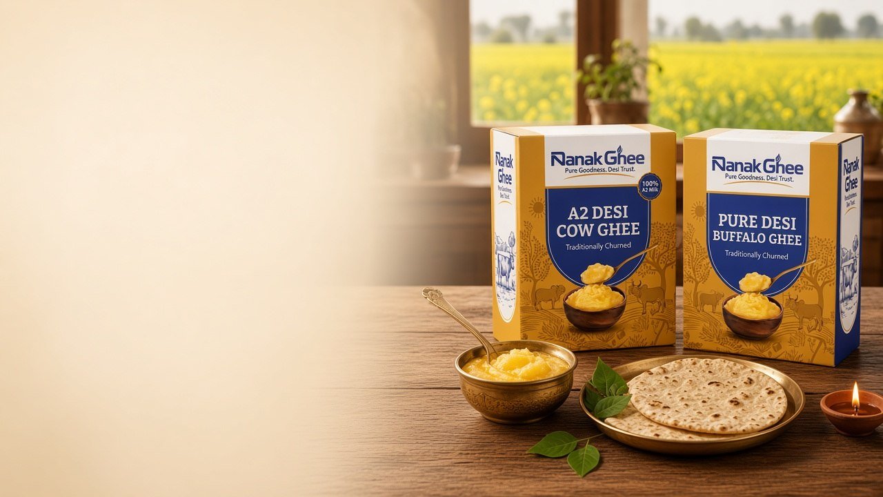 Nanak A2 desi cow ghee and buffalo ghee boxes with a brass katori of ghee and rotis